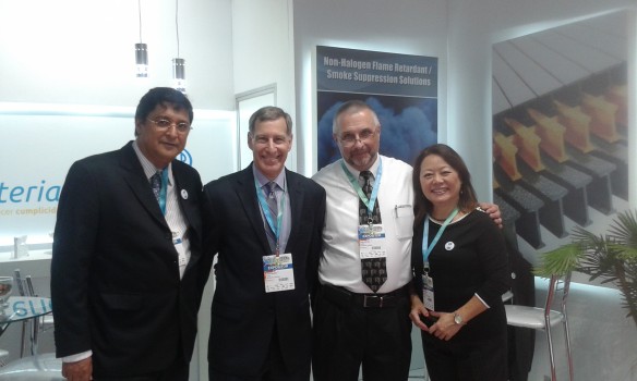 Huber exhibiting with its friends at Raw Material Comercio during the FEIPLAR Composites Exhibition.  Pictured (from left) are Aluisio Abreu of Raw Material Comercio; Mitch Halpert and Gary Rex, Ph.D., of Huber Engineered Materials; and Marina Tsuda of Raw Material Comercio.